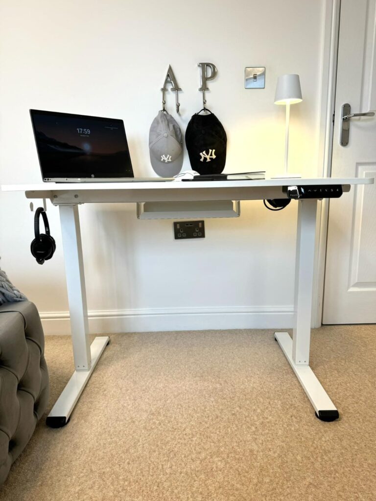 view of our own purchase testing flexispot e1 (reliable and well regarded) budget standing desk uk unboxing package arrival several weeks to months